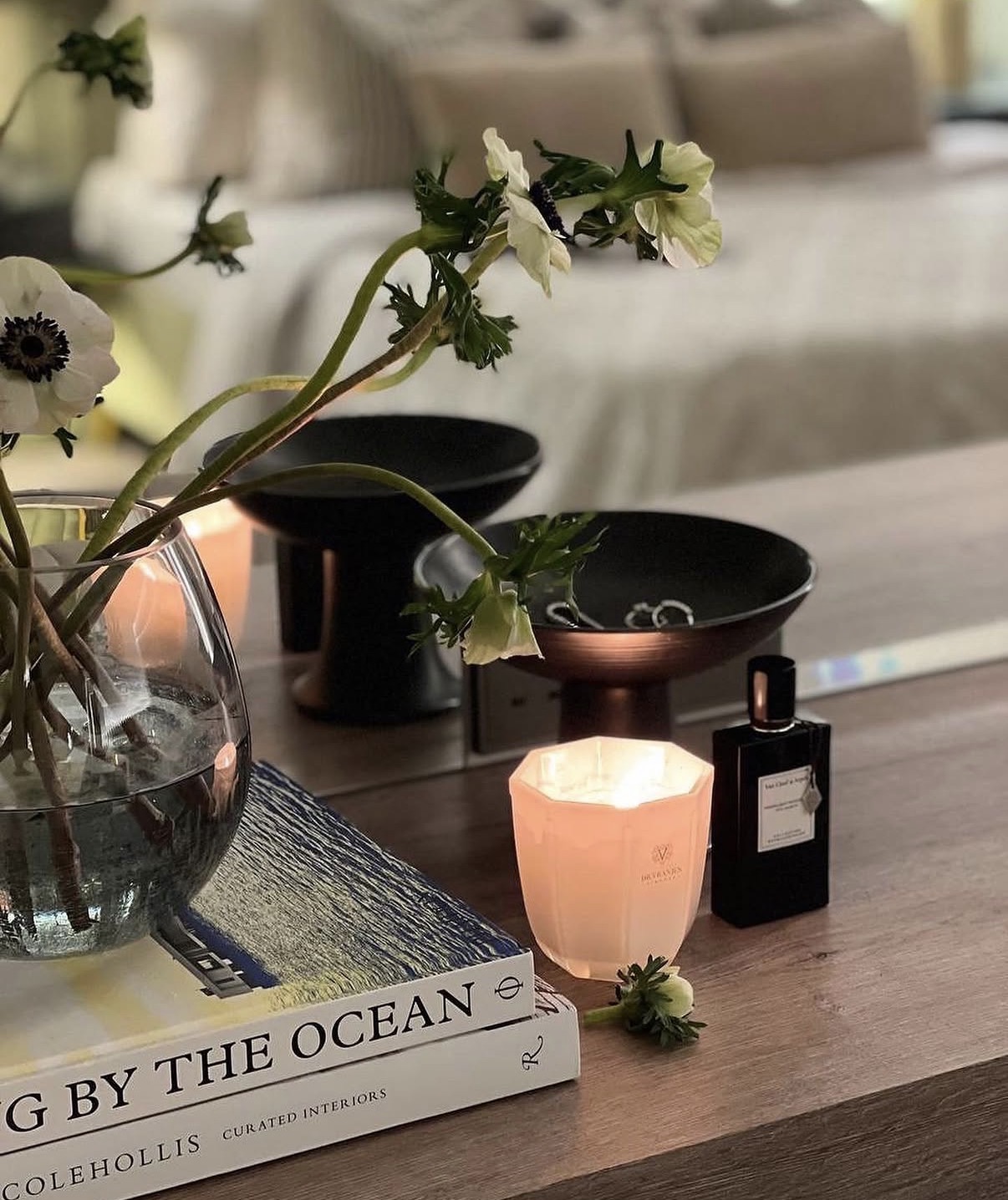 Decorative objects and flowers on a side table