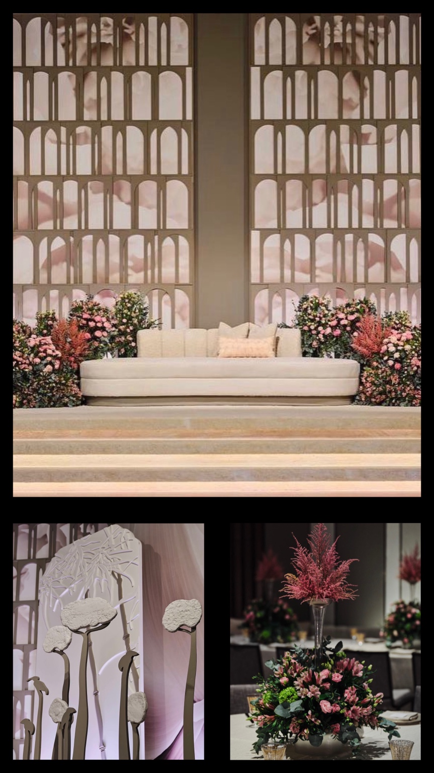 A floral wedding lounge framed by elegant arches
