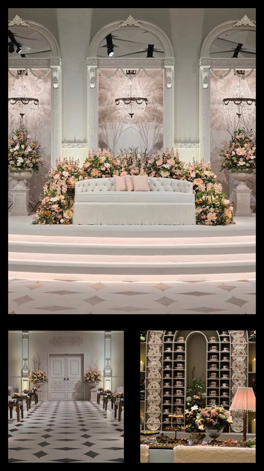 A romantic wedding stage with a flower-lined lounge